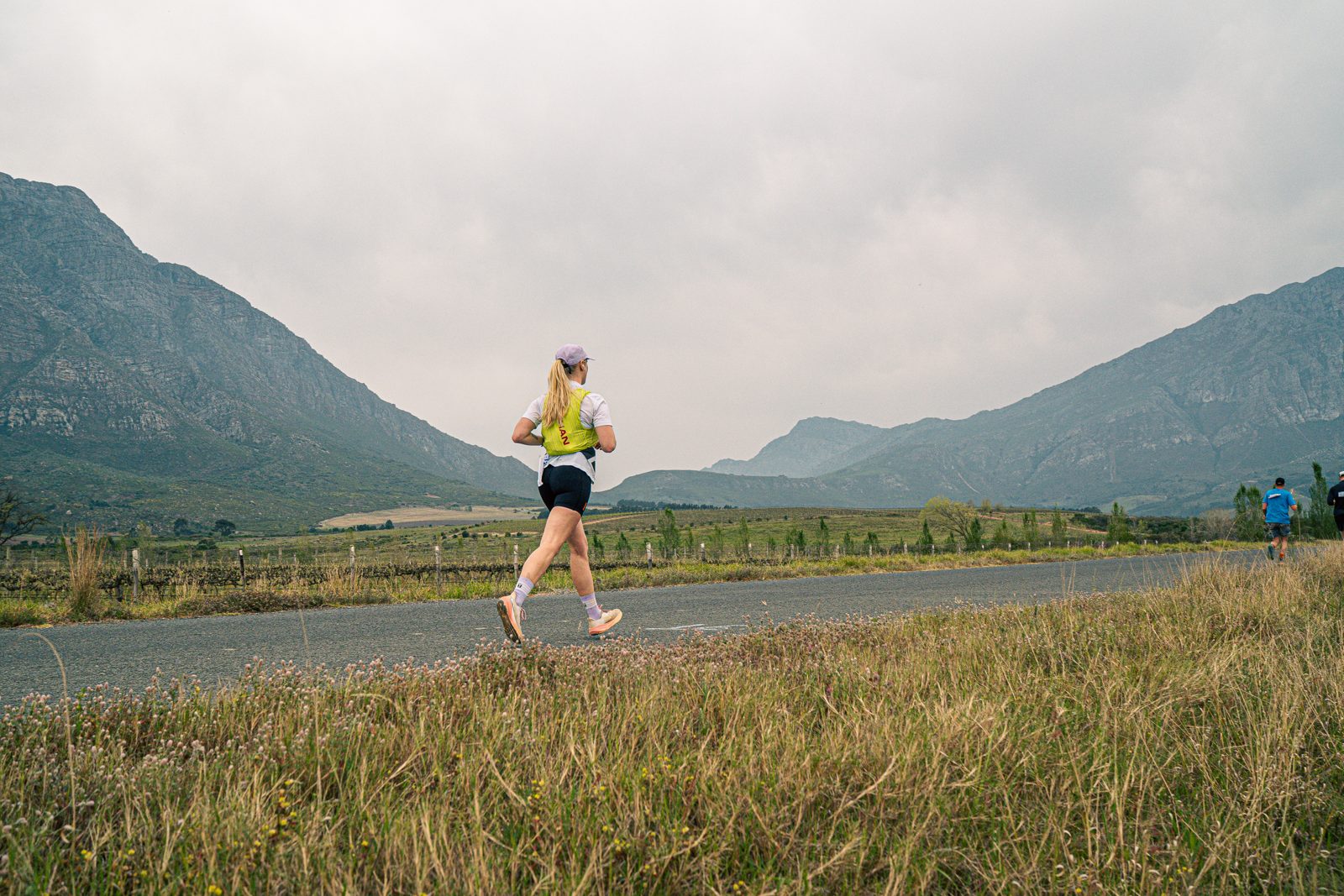 A runner on a training run along a country road